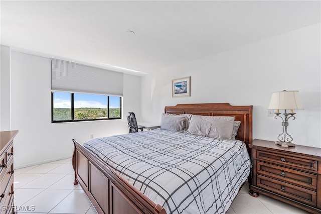 bedroom featuring light tile patterned floors