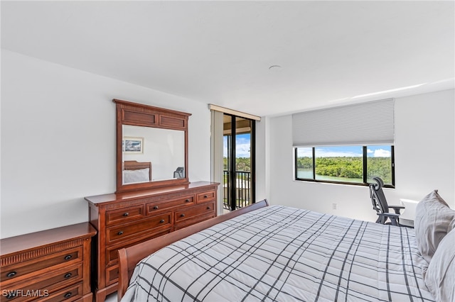 bedroom with access to outside