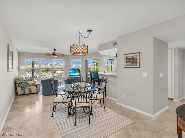 900 Collier Ct Unit 106, Marco Island, FL 34145 - dining area featuring visible vents, a ceiling fan, baseboards, and light tile patterned floors