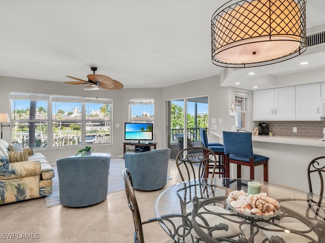 900 Collier Ct Unit 106, Marco Island, FL 34145 - dining area with light tile patterned floors, visible vents, recessed lighting, and ceiling fan
