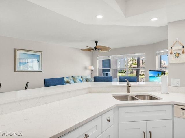 900 Collier Ct Unit 106, Marco Island, FL 34145 - kitchen with dishwasher, light countertops, a sink, and recessed lighting