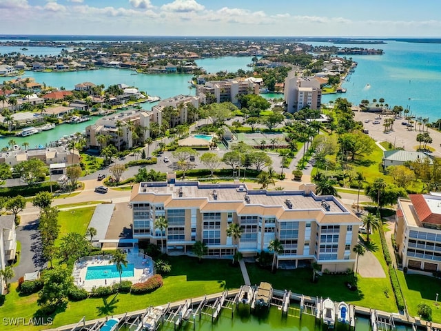 900 Collier Ct Unit 106, Marco Island, FL 34145 - drone / aerial view featuring a water view