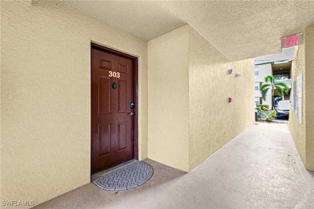 4121 Residence Dr Unit 303, Fort Myers, FL 33901 - entrance to property with stucco siding
