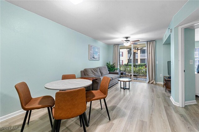4121 Residence Dr Unit 303, Fort Myers, FL 33901 - dining area featuring light wood finished floors, baseboards, and ceiling fan