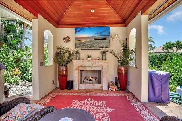 2363 Crayton Rd, Naples, FL 34103 - view of patio / terrace with a fireplace and a gazebo