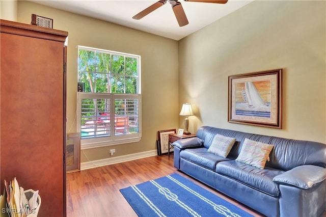 2363 Crayton Rd, Naples, FL 34103 - living area featuring wood finished floors, ceiling fan, and baseboards