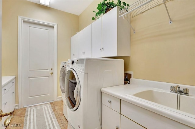 2363 Crayton Rd, Naples, FL 34103 - laundry room featuring cabinet space, washer and dryer, and light tile patterned floors