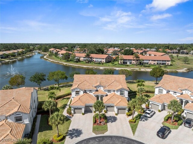 bird's eye view featuring a residential view and a water view