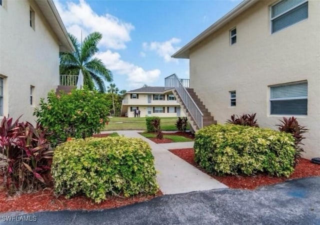 surrounding community featuring stairs