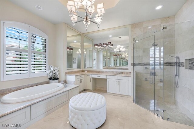 2927 Cinnamon Bay Cir, Naples, FL 34119 - full bathroom with healthy amount of natural light, a stall shower, a chandelier, and recessed lighting