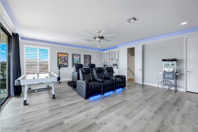 2927 Cinnamon Bay Cir, Naples, FL 34119 - living room featuring crown molding, light wood-type flooring, a ceiling fan, baseboards, and recessed lighting