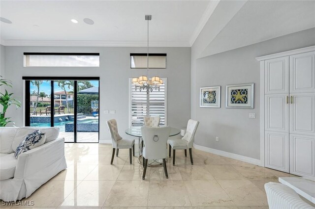 2927 Cinnamon Bay Cir, Naples, FL 34119 - dining room featuring crown molding, a chandelier, and baseboards