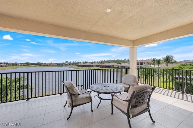2927 Cinnamon Bay Cir, Naples, FL 34119 - view of patio with a water view and a balcony
