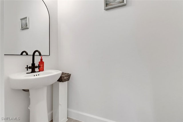 bathroom featuring baseboards