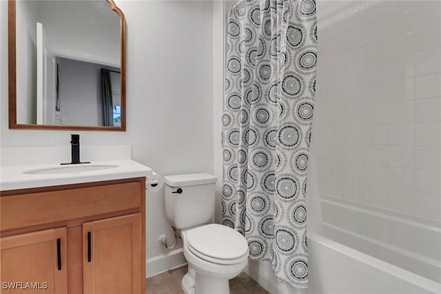 full bath with vanity, baseboards, shower / bath combo, and toilet