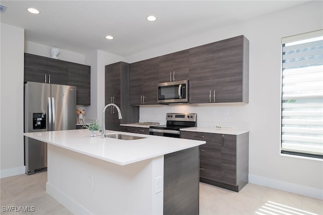 5590 Agostino Way, Ave Maria, FL 34142 - kitchen with appliances with stainless steel finishes, a sink, plenty of natural light, modern cabinets, and recessed lighting