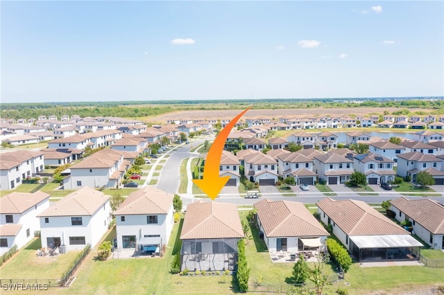 drone / aerial view featuring a residential view