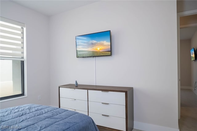 bedroom with baseboards