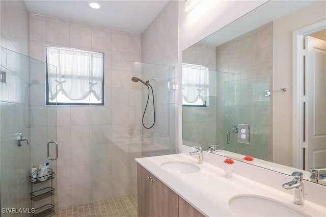 5590 Agostino Way, Ave Maria, FL 34142 - full bathroom featuring a stall shower, double vanity, and recessed lighting