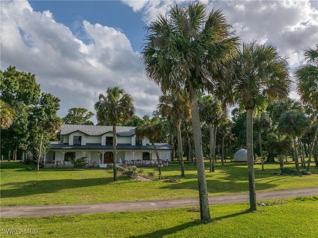 view of community with a lawn