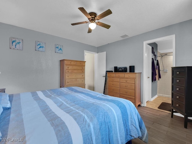 1210 Marlow St, Port Charlotte, FL 33952 - bedroom featuring baseboards, wood finished floors, visible vents, and a ceiling fan