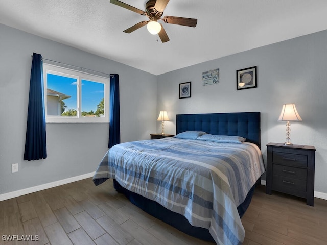 1210 Marlow St, Port Charlotte, FL 33952 - bedroom with wood finished floors, baseboards, and ceiling fan