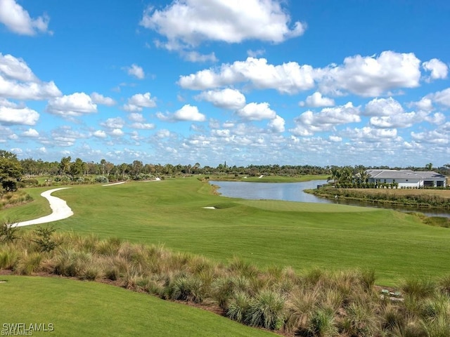 9834 Giaveno Cir Unit 1717, Naples, FL 34113 - view of community with a water view, golf course view, and a yard