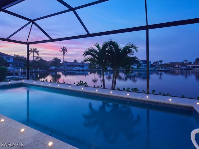 870 Robin Ct, Marco Island, FL 34145 - outdoor pool featuring a water view and glass enclosure