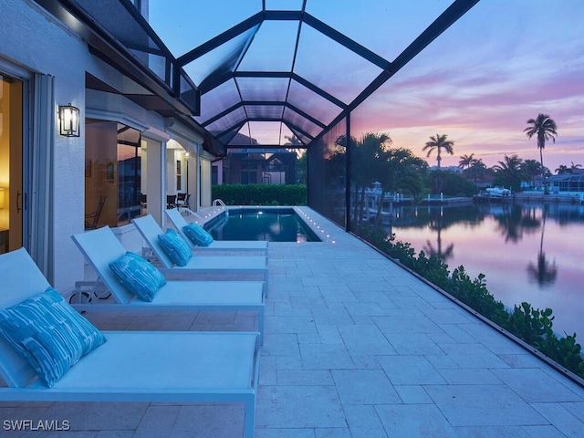 870 Robin Ct, Marco Island, FL 34145 - view of swimming pool with a hot tub, an infinity pool, a water view, a patio, and glass enclosure