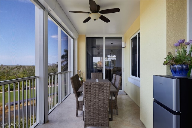 4761 W Bay Blvd Unit 303, Estero, FL 33928 - sunroom / solarium with a chandelier
