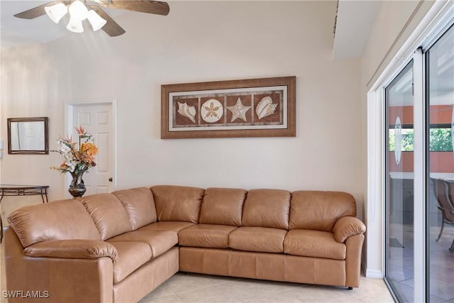 212 SE 30th Ter, Cape Coral, FL 33904 - living area with ceiling fan and light tile patterned flooring