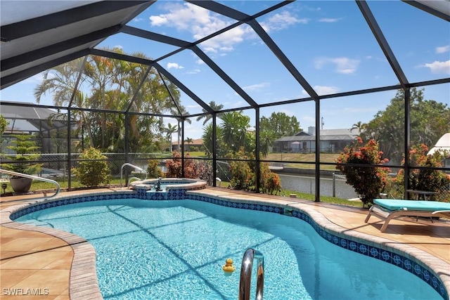 212 SE 30th Ter, Cape Coral, FL 33904 - view of pool with a patio area, a pool with connected hot tub, glass enclosure, and a water view