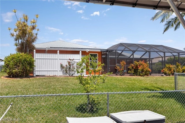 212 SE 30th Ter, Cape Coral, FL 33904 - view of yard with a lanai