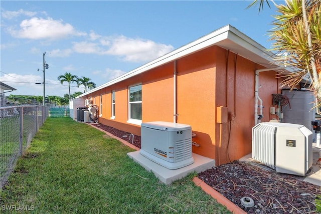 212 SE 30th Ter, Cape Coral, FL 33904 - view of side of property with stucco siding and cooling unit
