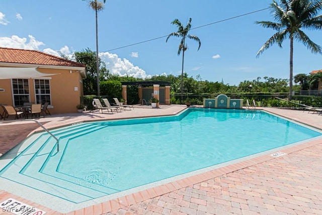 8617 River Homes Ln Unit 3108, Bonita Springs, FL 34135 - community pool with a patio area