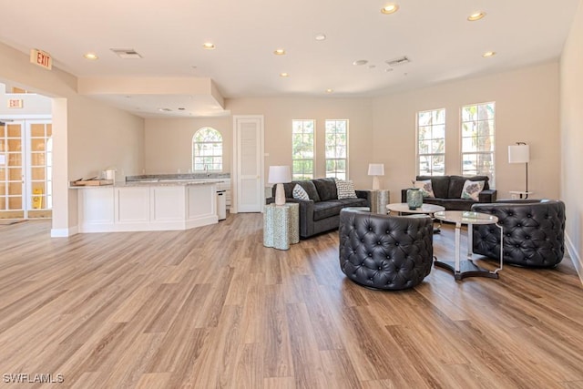 8617 River Homes Ln Unit 3108, Bonita Springs, FL 34135 - living area featuring light wood-type flooring and recessed lighting