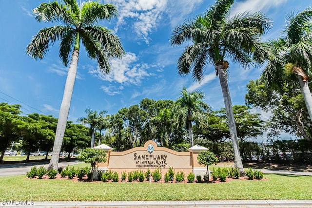 8617 River Homes Ln Unit 3108, Bonita Springs, FL 34135 - community / neighborhood sign with a lawn