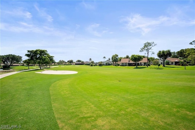 1624 Pine Valley Dr Unit 115, Fort Myers, FL 33907 - surrounding community featuring a lawn, a residential view, and golf course view