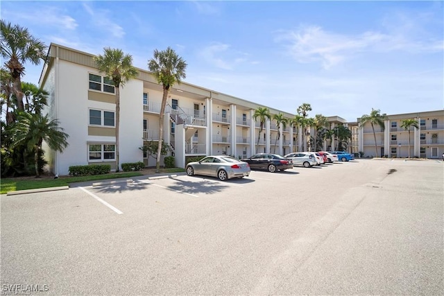 1624 Pine Valley Dr Unit 115, Fort Myers, FL 33907 - view of uncovered parking lot