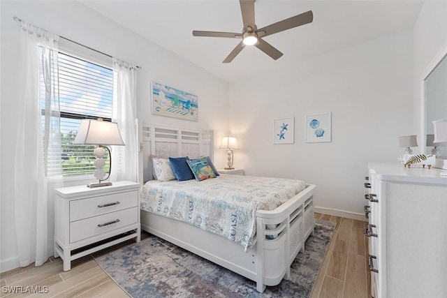 14071 Binghampton Dr, Fort Myers, FL 33905 - bedroom with light wood-style floors and ceiling fan