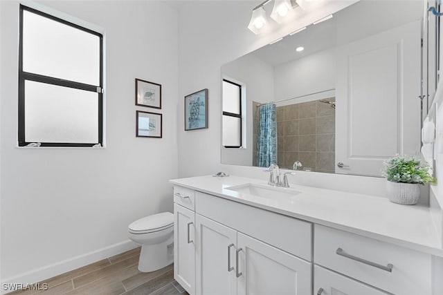 14071 Binghampton Dr, Fort Myers, FL 33905 - bathroom with vanity, wood finished floors, and a shower with curtain