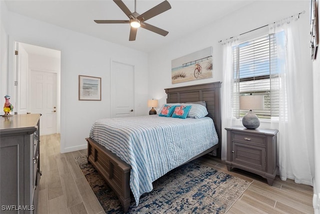 14071 Binghampton Dr, Fort Myers, FL 33905 - bedroom featuring light wood-style floors and a ceiling fan