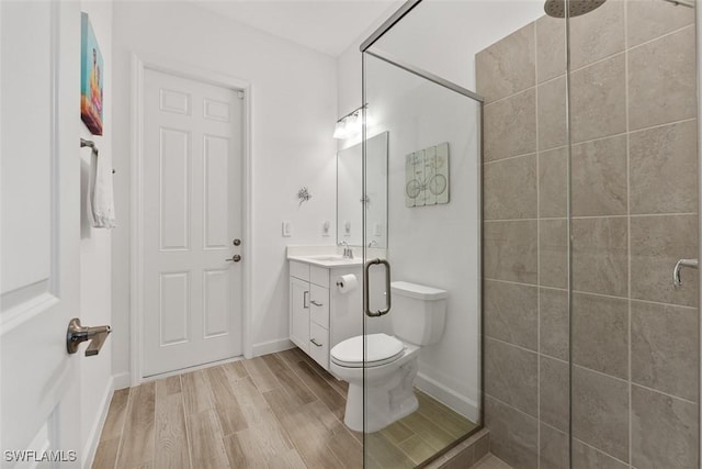 14071 Binghampton Dr, Fort Myers, FL 33905 - full bath with vanity, wood finished floors, and a tile shower