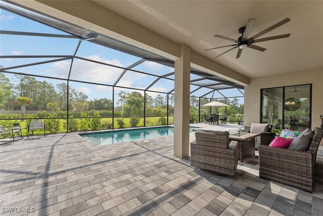 14071 Binghampton Dr, Fort Myers, FL 33905 - view of patio / terrace with ceiling fan, outdoor lounge area, an outdoor pool, and a lanai