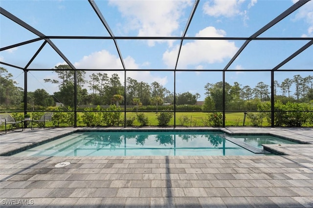 14071 Binghampton Dr, Fort Myers, FL 33905 - outdoor pool featuring a patio area and glass enclosure