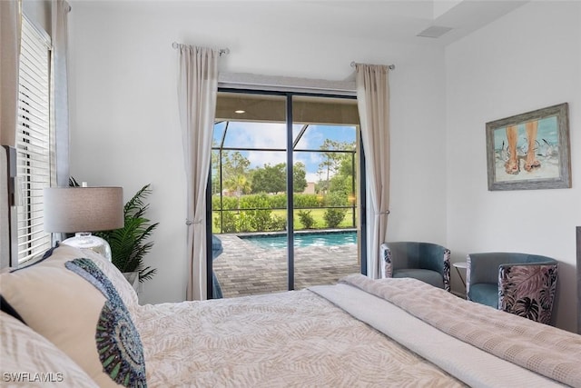 14071 Binghampton Dr, Fort Myers, FL 33905 - bedroom with access to exterior and multiple windows