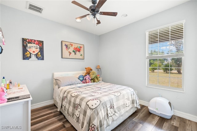 4551 Fort Center Ave, Fort Denaud, FL 33935 - bedroom with wood finished floors, visible vents, a ceiling fan, and baseboards