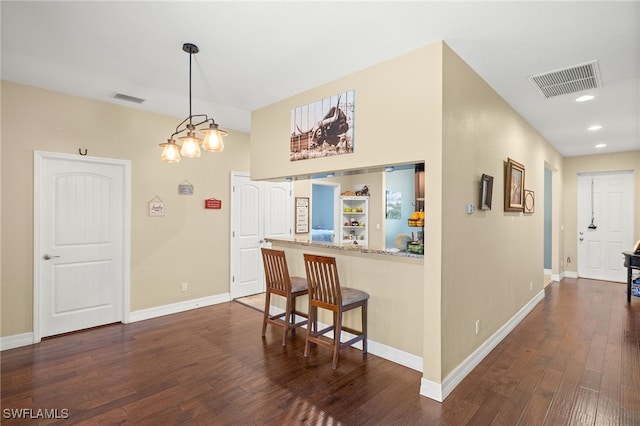 4551 Fort Center Ave, Fort Denaud, FL 33935 - kitchen with baseboards, dark wood-style flooring, and visible vents