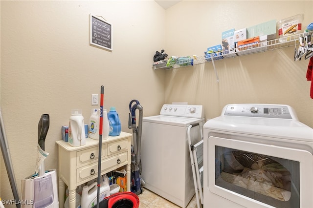 4551 Fort Center Ave, Fort Denaud, FL 33935 - clothes washing area featuring light tile patterned floors, laundry area, and independent washer and dryer