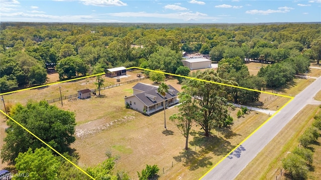 4551 Fort Center Ave, Fort Denaud, FL 33935 - birds eye view of property with a wooded view